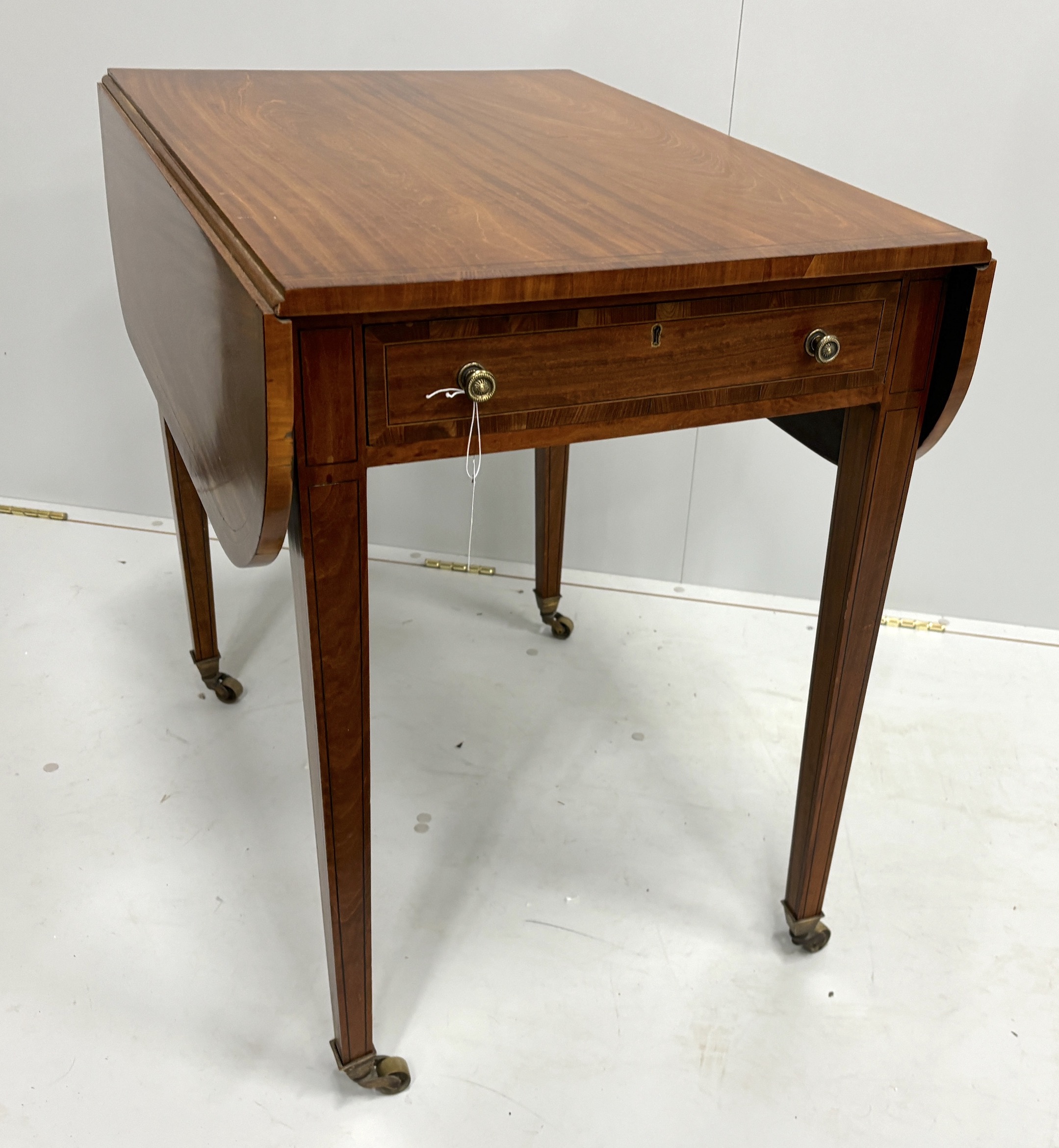 A George III coromandel banded satinwood Pembroke table, width 53cm, depth 76cm, height 73cm